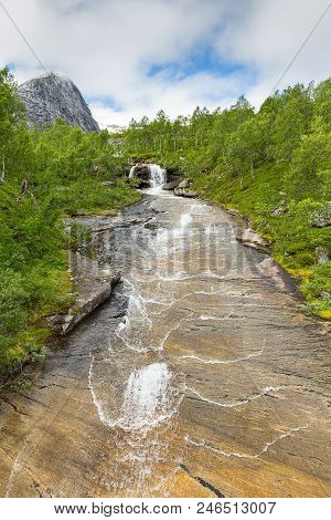 Torrent Plunges From The Mountains On Lofoten, Nordland, Norway