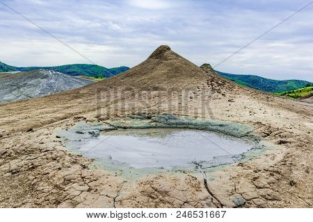 Buzau, Paclele Mari, Romania: Bubbling Mud, Landscape With Muddy Volcano At Sunset - Landmark Attrac