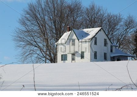 Old Home Stead On A Snowy Winter Day