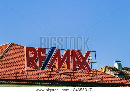 Vilnius, Lithuania - May 10, 2018: Remax Sign On The Building Rooftop. Remax Is American Internation