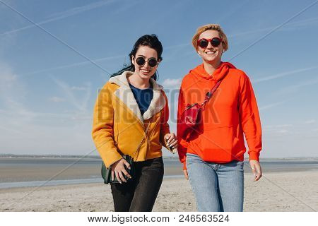 Beautiful Female Friends On Sandy Beach, Saint Michaels Mount, Normandy, France
