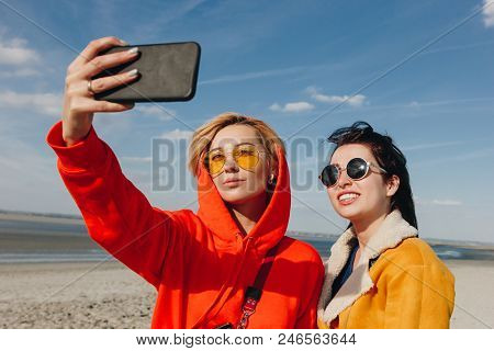 Happy Female Friends Taking Selfie Sandy Beach, Saint Michaels Mount, Normandy, France