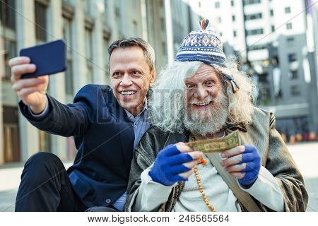 Surprised Vagrant. Elderly Homeless Vagrant Feeling Extremely Surprised After Receiving Money From K