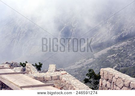 View In Serbian Mountains Landscape In Dense Clouds.
