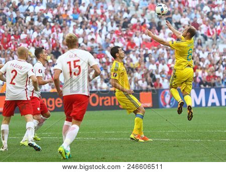 Marseille, France - June 21, 2016: Roman Zozulya Of Ukraine (r) Receives A Ball During The Uefa Euro