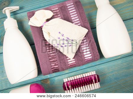 Spa Accessories For Hygenic And Bath In A Composition On A Blue Background.