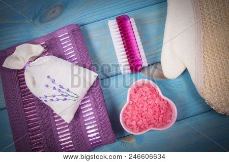 Spa Accessories For Hygenic And Bath In A Composition On A Blue Background.