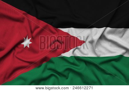 Jordan Flag  Is Depicted On A Sports Cloth Fabric With Many Folds. Sport Team Waving Banner