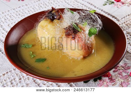 Baked Apple In Sirup With Sugar Floss