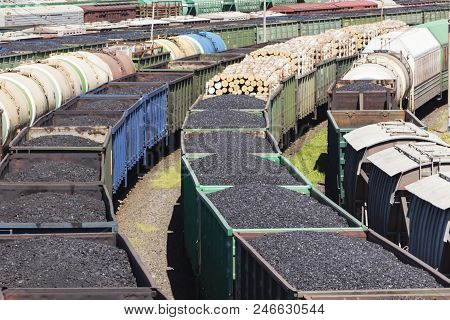 Rail Cars Loaded With Coal, A Train Transports Coal.