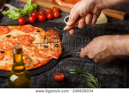 Pizza On The Table Stretching Cheese With Cut Couscous, Side View