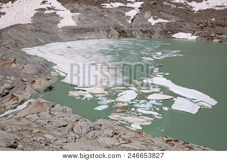 Rhone glacier, source of Rhone river, melting and retreating due to global warming. Rhone glacier is loosing up to 2 meters in length every year.