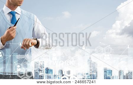 Double Exposure Of Confident And Young Businessman In Smart-casual Wear Smoking Pipe And Modern City