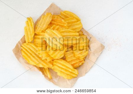 Crispy Crunchy Potato Chips Are A Great Party Munchies. Delicious Food Snack. Waved Rudged Fried Sli