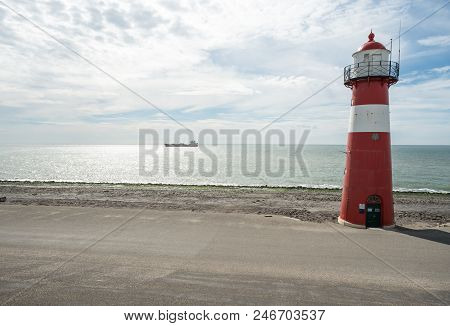 This Lighthouse Is Located In The Netherlands In Westkapelle By The Sea
