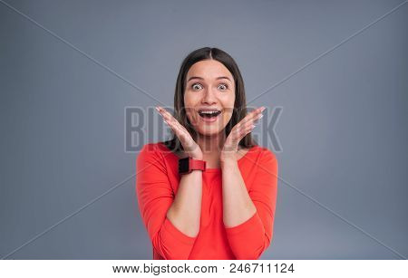 Emotional Reaction. Overjoyed Young Woman Reacting To A Pleasant Surprise And Shouting Happily While