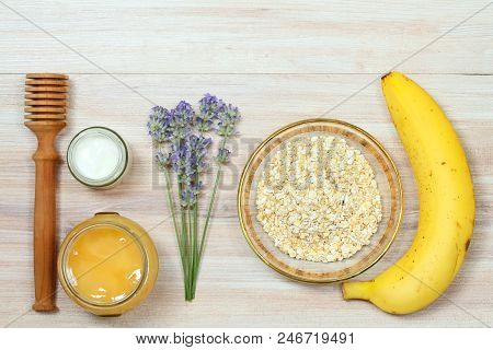 Face Mask From Oatmeal, Yogurt, Banana  And Honey. Ingredients For Homemade Facial Mask Decoreted Wi