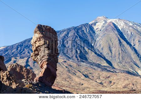 Panoramic View Of Unique Rock Formation Roque Cinchado And Pico Del Teide Mountain Volcano On A Sunn