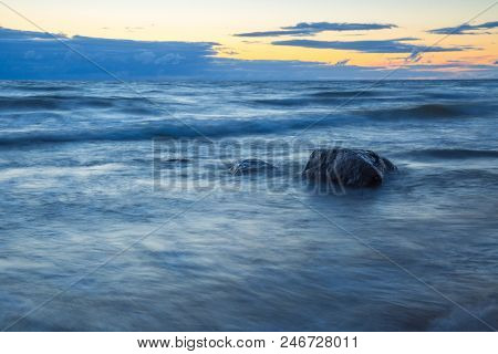 Baltic Sea In Latvia. Nature, Rocks And Sunset.
