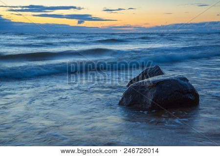 Baltic Sea In Latvia. Nature, Rocks And Sunset.