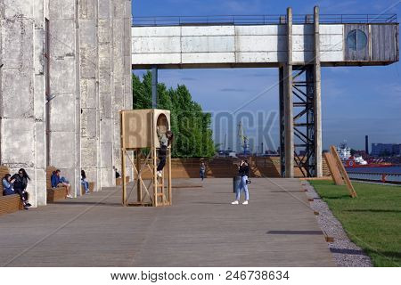 ST. PETERSBURG, RUSSIA - JUNE 1, 2018: People in the port Sevkabel during Red Bull BC One Camp Russia 2018. Red Bull BC One is the biggest one-on-one B-Boy competition in the world