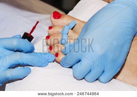 Woman Feet Receiving Pedicure. Close Up Concept