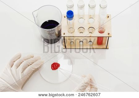 Lab Tube, Eppendorfs With Red Liquid. White Background. Studio Shot