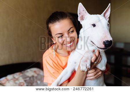 Cute Girl Petting Her Dog.beautiful Girl Having Fun With Her Dog And Enjoying Herself.girl And Her D