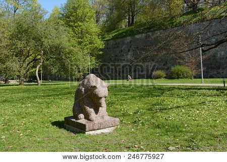 Tallinn, Estonia - May 12, 2018: Stone Sculpture Of A Bear In Hirvepark - Deer Park In Tallinn, A Un