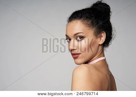 Beauty Closeup Portrait Of Beautiful Mixed Race Woman Wearing Chocker Looking At Camera, Isolated On