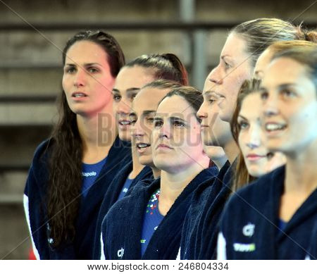 Budapest, Hungary - Jul 16, 2017. Hungarian women waterpolo team listen the national anthem, BUJKA Barbara in focus. FINA Waterpolo World Championship was held in Alfred Hajos Swimming Centre.