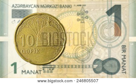 10 Azerbaijani Qepik Coin Against 1 Azerbaijani Manat Bank Note