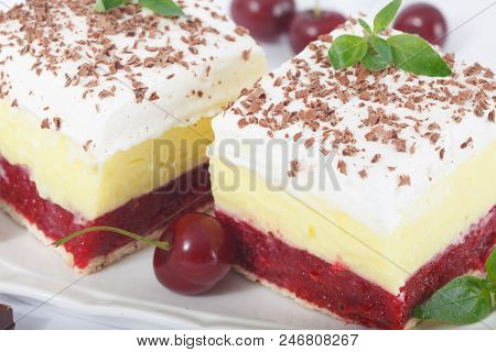 Closeup Of Two Slices Of Sweet Homemade Cherry Cake With Layers Of Vanilla And Whipping Cream