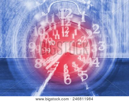 Concept Of Time Passing On A Analog Clock With Blurred Zoom Effect