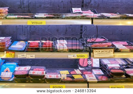 MILAN, ITALY - CIRCA NOVEMBER, 2017: assortment of meat products on display for sale at Carrefour Express in Milan.