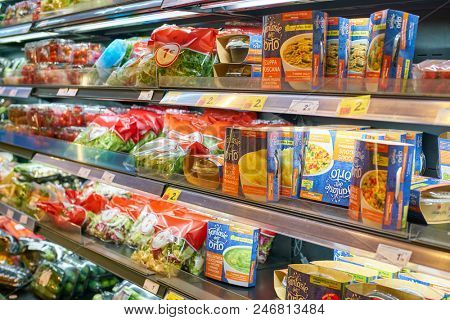 MILAN, ITALY - CIRCA NOVEMBER, 2017: assortment of food on display for sale at Carrefour Express in Milan.
