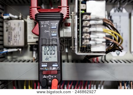 Electrical Engineer Is Check Electrical Equipment With A Multi-meter