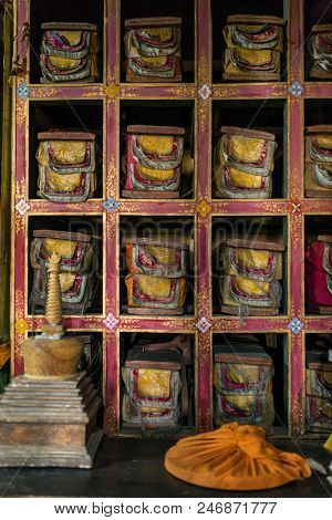 Leh, India - June 26, 2017: Folios of old manuscripts in library of Stakna gompa Tibetan Buddhist Monastery in Ladakh, India