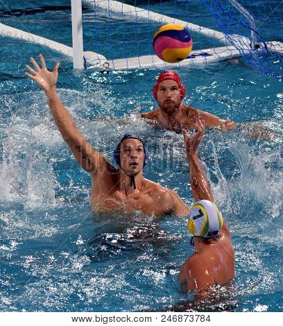 Budapest, Hungary - Jul 17, 2017. NAGY Viktor (HUN) and VARGA Denes (HUN) defend against  GILCHRIST Jarrod (AUS). FINA Waterpolo World Championship was held in Alfred Hajos Swimming Centre.