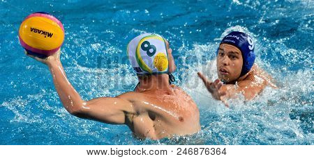 Budapest, Hungary - Jul 17, 2017. ERDELYI Balazs (HUN) waterpolo player (in blue) fights with YOUNGER Aaron (AUS). FINA Waterpolo World Championship was held in Alfred Hajos Swimming Centre.
