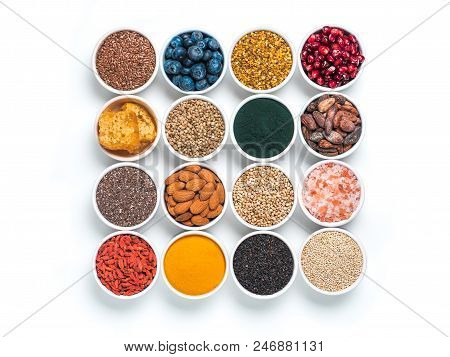 Various Superfoods In Smal Bowl Isolated On White Background. Superfood As Chia, Spirulina, Raw Coco