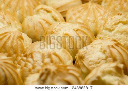 Image Filled Of Profiteroles. Delicious Tasty French Bakery.