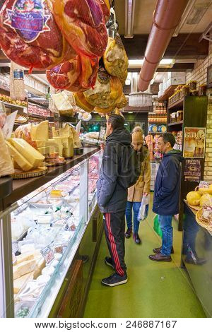 MILAN, ITALY - CIRCA NOVEMBER, 2017: assortment of cheese and meat products on display in shop in Milan.