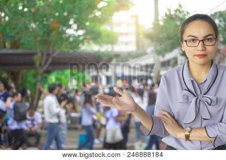 This Career Saleman Or Business Woman Inspection Writing On Notepad Or Book, Paper With Building And