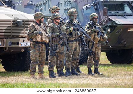 Feldkirchen / Germany - June 9, 2018: German Soldiers Stands Near Military Vehicles On A Open Day On