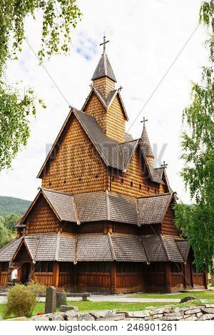 Heddal, Norway-august 15, 2014 -  Old Stave Church And Cemetery In Norwegian Village.