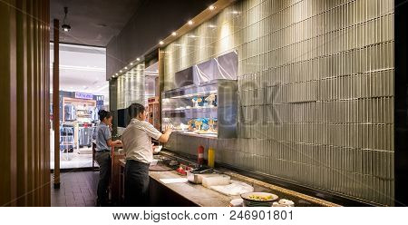 Bangkok, Thailand - May 20: Restaurant Servers Communicate With The Kitchen Regarding Customer Order
