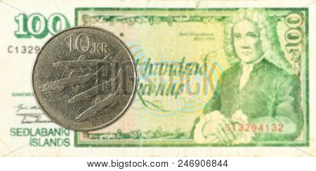 10 Icelandic Krona Coin Against 100 Icelandic Krona Bank Note