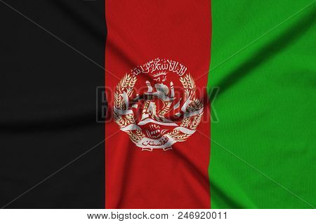 Afghanistan Flag Is Depicted On A Sports Cloth Fabric With Many Folds. Sport Team Waving Banner