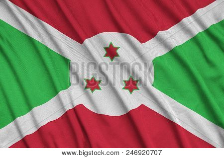 Burundi Flag  Is Depicted On A Sports Cloth Fabric With Many Folds. Sport Team Waving Banner